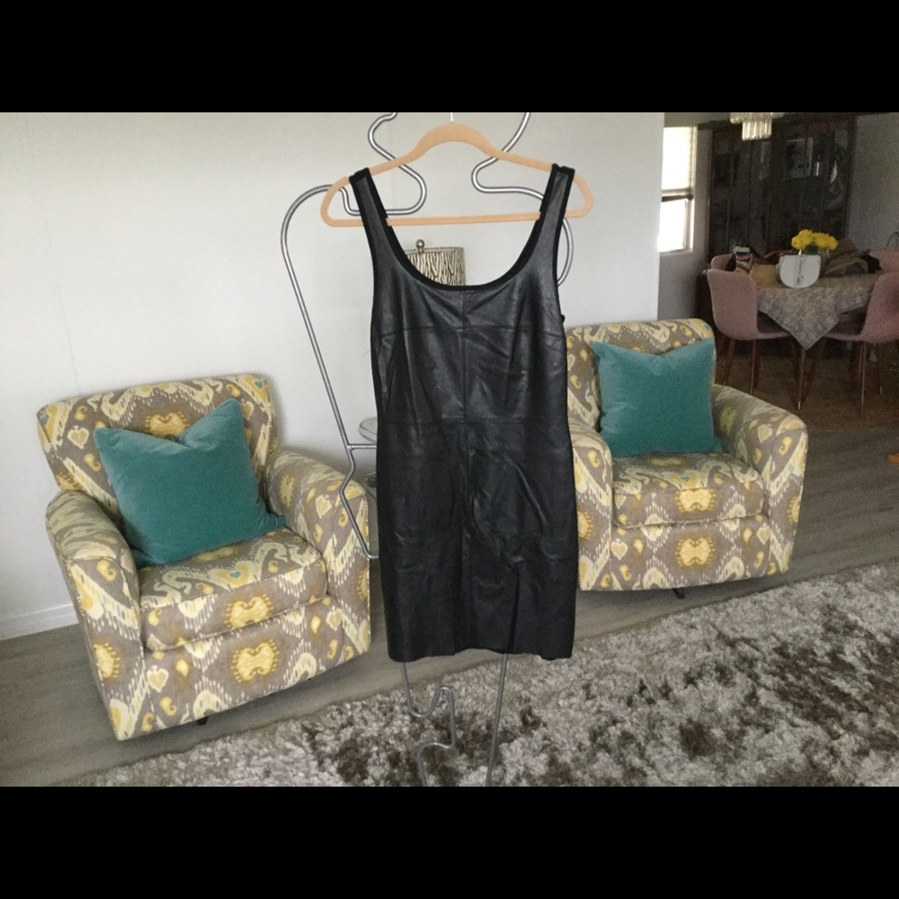 Black leather and knit form fitting dress